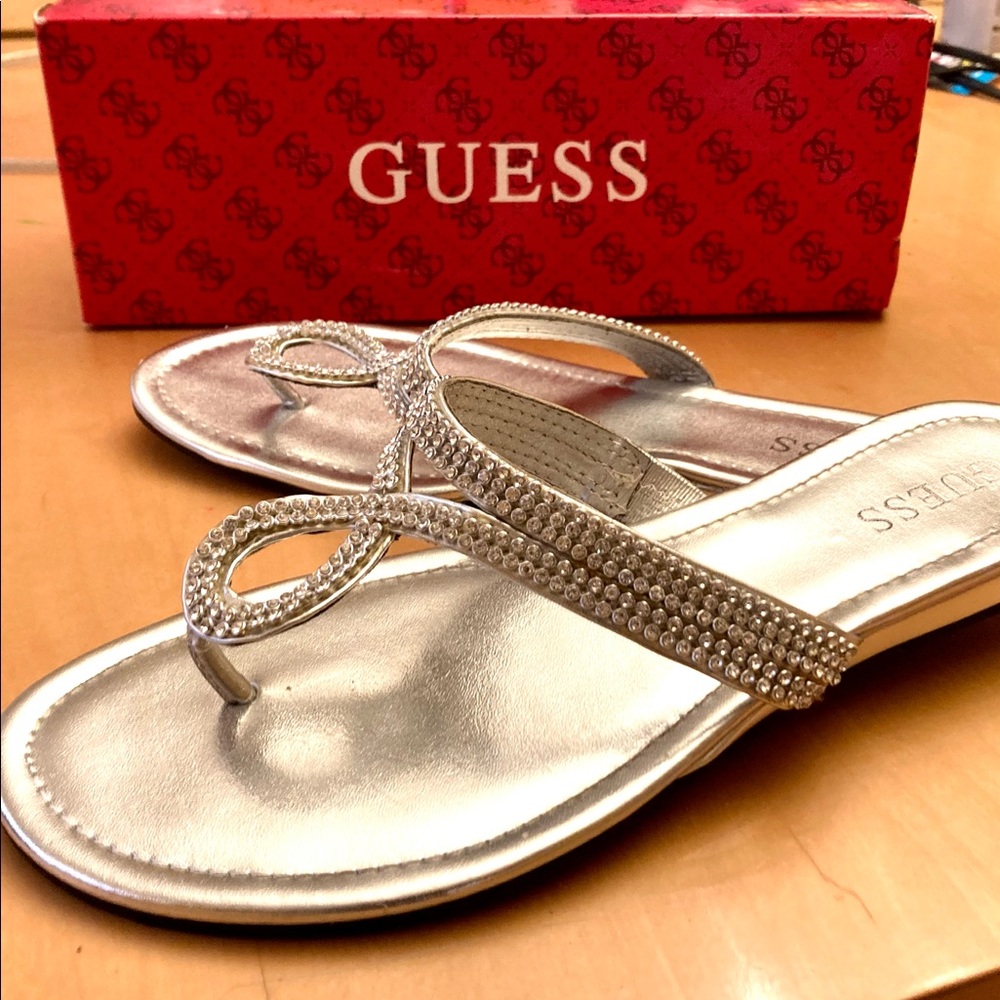 Guess silver thong sandals with “bling” on the straps